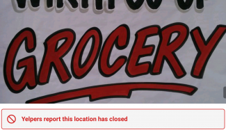 Cropped screenshot from a cell phone with the word grocery prominent and "Yelpers report this location has closed"